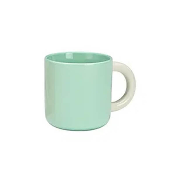 Tasse en porcelaine turquoise de 340ml, idéale pour le café et le thé.


