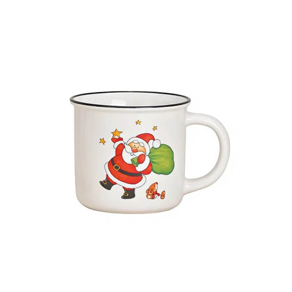 Mug d'Hiver – Père Noël et Ciel Étoilé 355ml. Tasse en porcelaine blanche avec un joyeux Père Noël portant un sac de cadeaux, accompagné d'un petit chien et entouré d'étoiles. Idéale pour la période de Noël.
