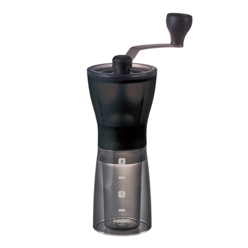 Hario Ceramic Coffee Mill Mini-Slim Plus in transparent black with ergonomic handle and compact design.
