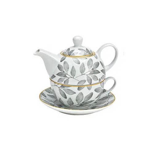 Set da tè elegante in porcellana con motivo a foglie, include teiera e tazza su un piattino, ideale per un'esperienza di tè raffinata.