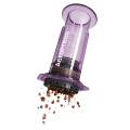 Inverted AeroPress Clear Purple coffee press with coffee beans