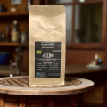 espresso bio beanarella Espresso Bolivia, grains entiers, certifié Fairtrade, sac sur table en bois
