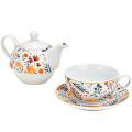 Théière en porcelaine avec tasse et soucoupe, ornée d'un décor floral vibrant, idéale pour des heures de thé élégantes.