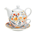 Théière en porcelaine avec tasse et soucoupe, ornée d'un décor floral vibrant, idéale pour des heures de thé élégantes.
